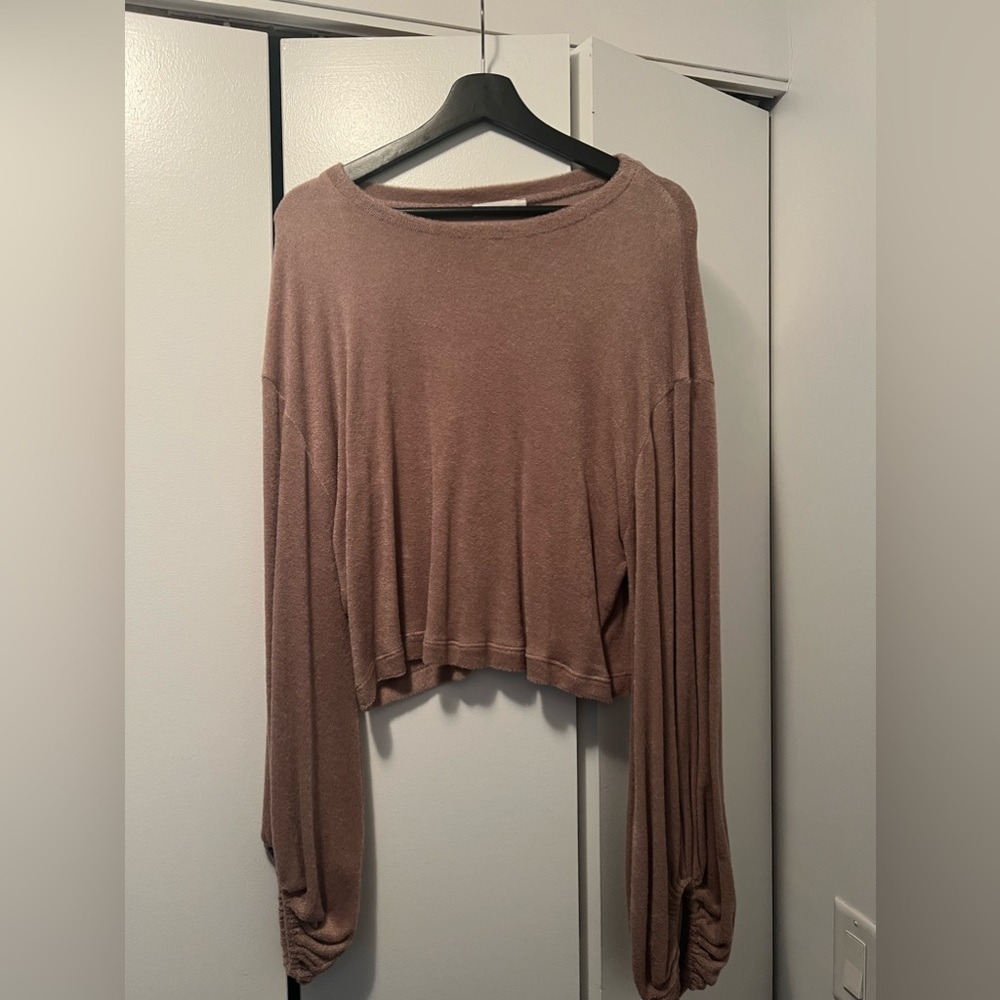 Towel material long sleeve cuffed at the wrist
